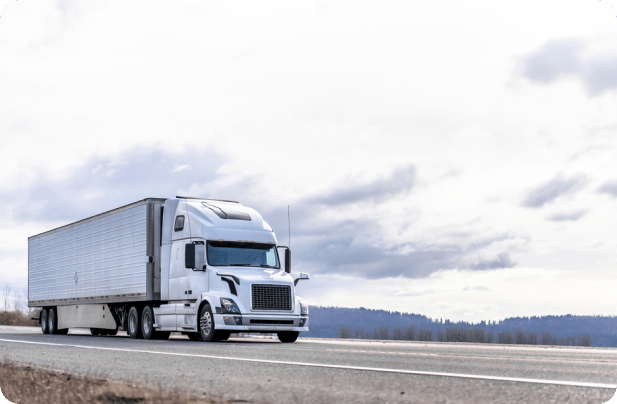 Temperature monitoring dashboard beside a refrigerated truck